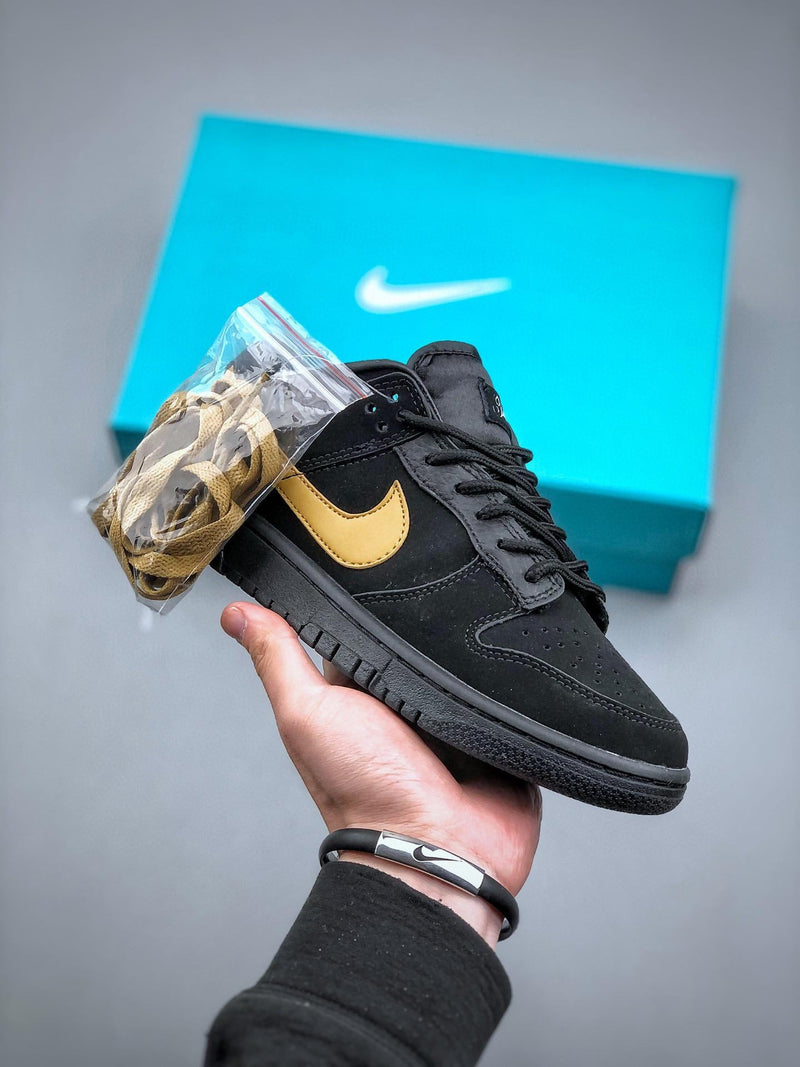 Tênis Nike SB Dunk Low "Black Gold"